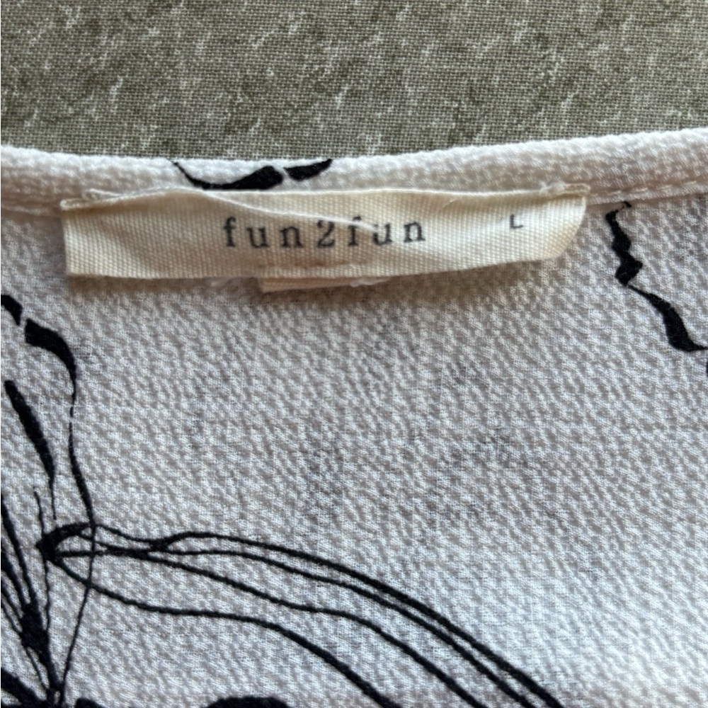 White V-Neck Floral Blouse with Black Print - Picture 2 of 3